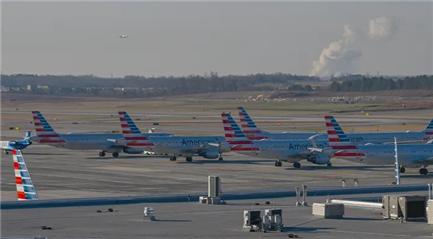 猎股网 美航一飞机起落架舱内发现偷渡者遗体